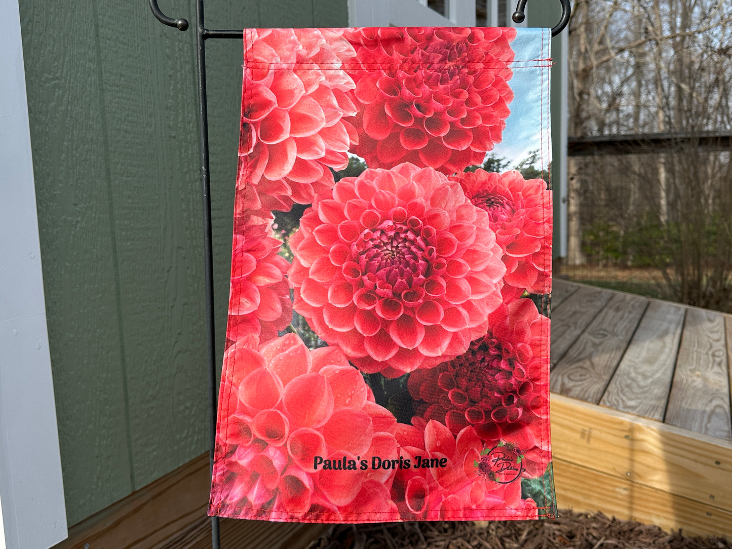 Garden flag with pink flowers of Paula's Doris Jane dahlias.