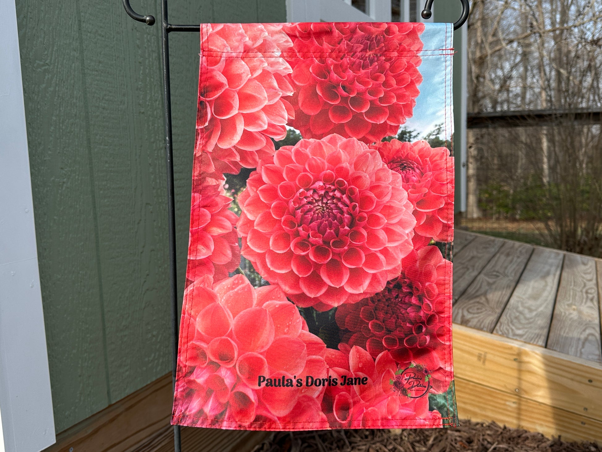 Garden flag with pink flowers of Paula's Doris Jane dahlias.