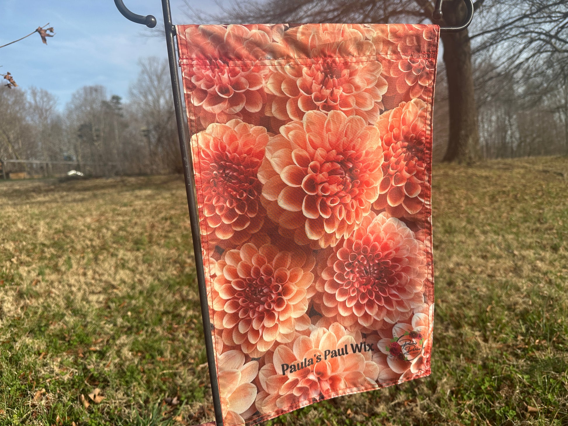 Decorative garden flag with bronze flowers of Paula's Paul Wix dahlias.